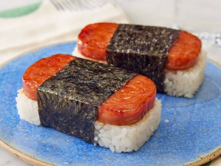 Sliced Spam musubi rolls on a plate
